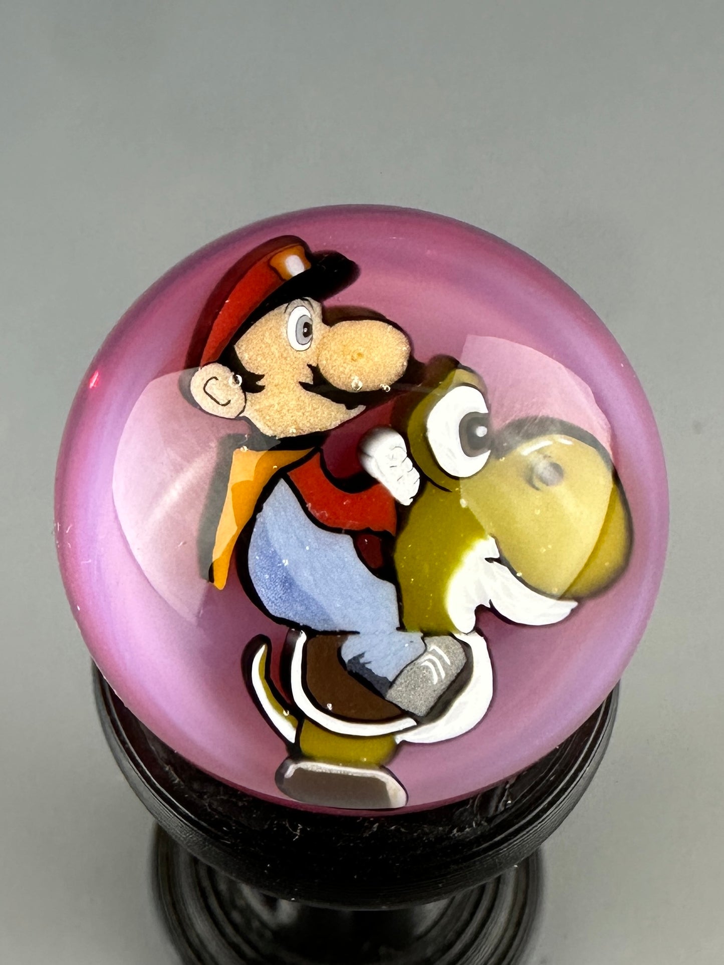 Pink M riding Yosh marble